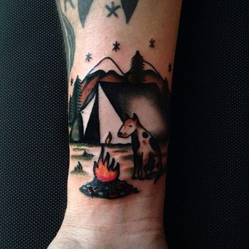 Dog by the campfire tattoo