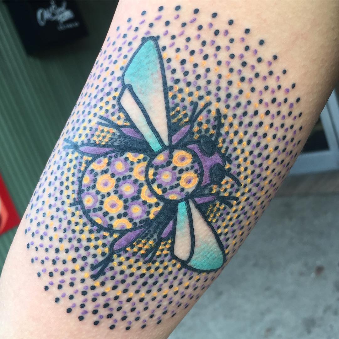 Dotted bee tattoo