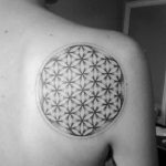 Dotwork black and grey flower of life tattoo