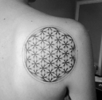 Dotwork black and grey flower of life tattoo