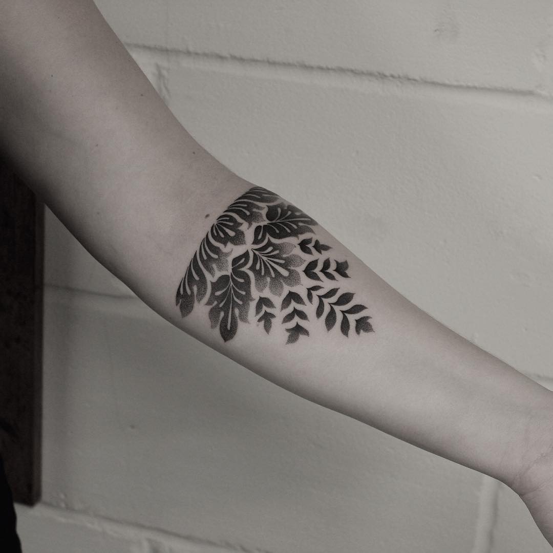 Dotwork half floral mandala tattoo