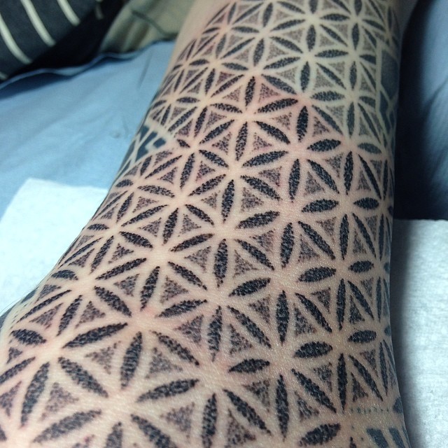 Dotwork sacred geometry arm tattoo