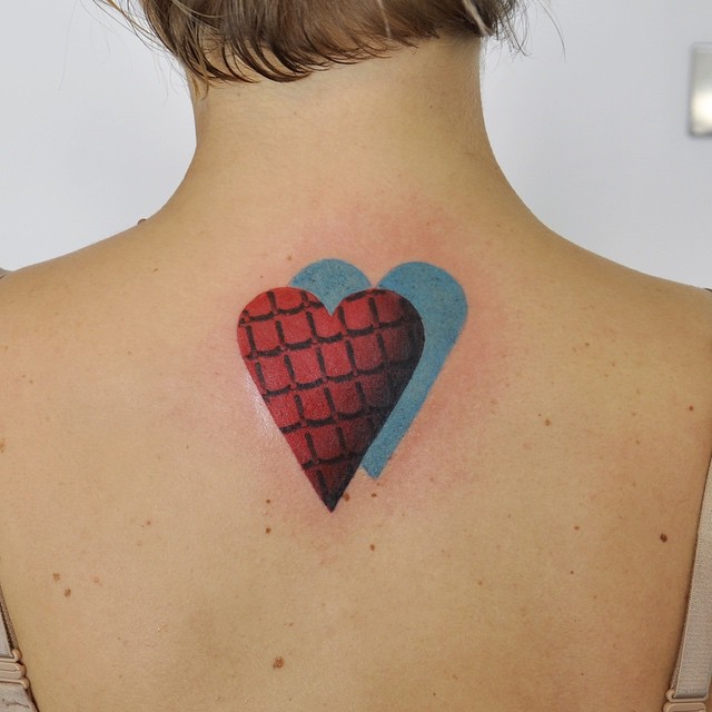 Double heart tattoo with a 3d pattern