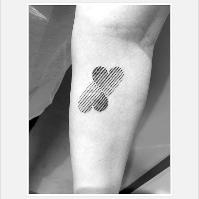 Double heart tattoo