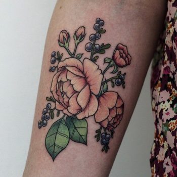 Elegant orange flower tattoo