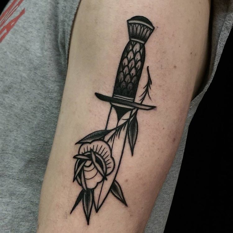 Fine dagger and rose tattoo