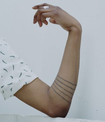 Five thin lines tattoo