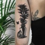 Flower vase and cat tattoo