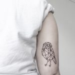 Geometric bird tattoo