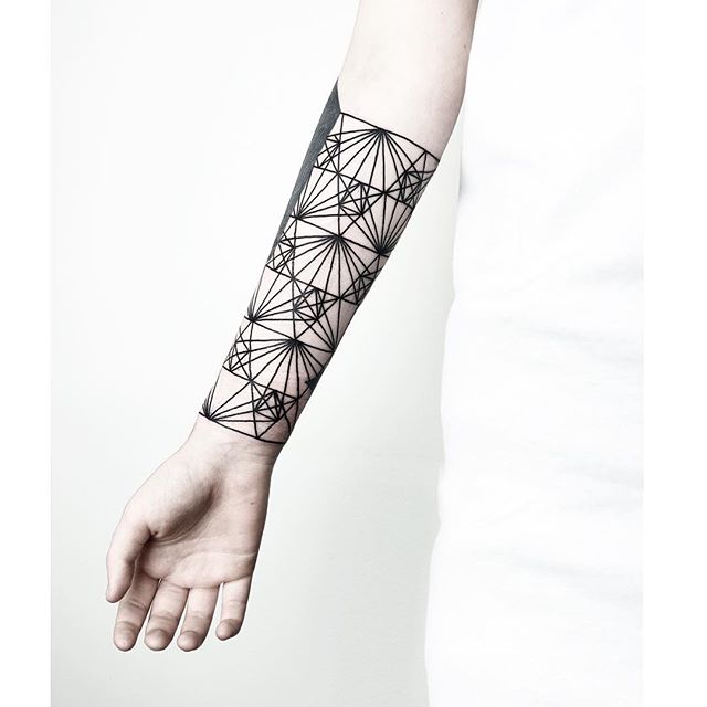 Geometric linear ornament tattoo