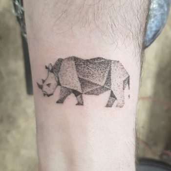 Geometric rhino tattoo
