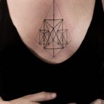 Geometric sternum tattoo