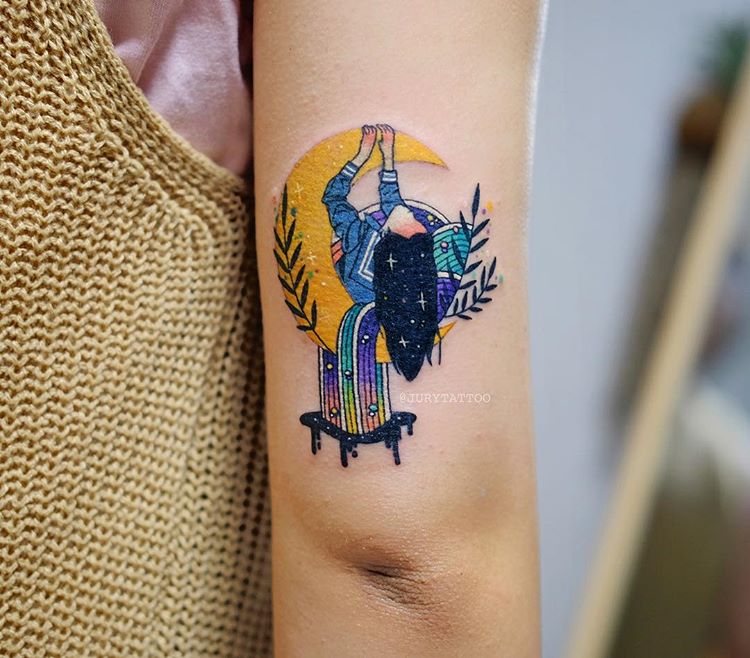 Girl on a crescent moon tattoo