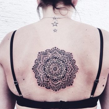 Gorgeous dotwork mandala tattoo on the back