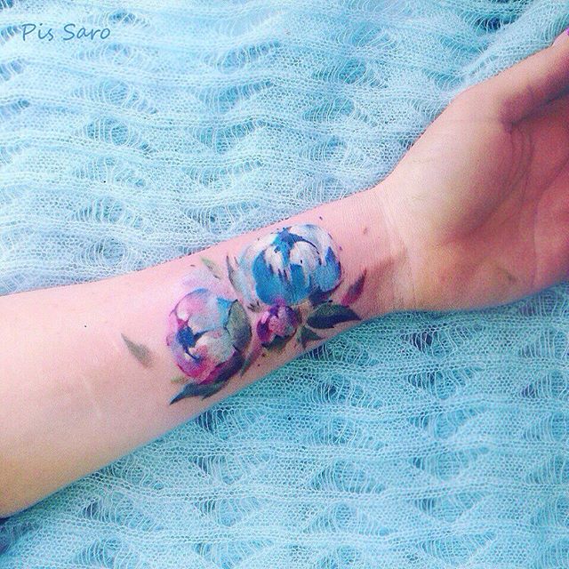 Gorgeous floral tattoo on the inner wrist