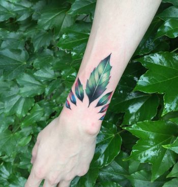 Gorgeous green leaves tattoo