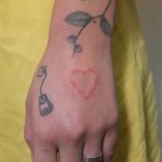 Heart shaped barbed wire tattoo