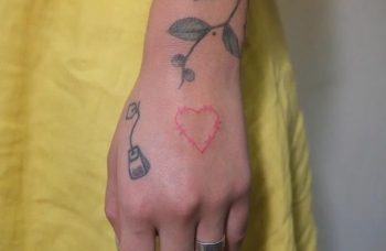 Heart shaped barbed wire tattoo