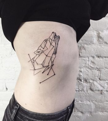 Howling wolf on the rib