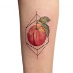 Hyper realistic apple tattoo