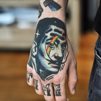 Hyper realistic salvador dali tattoo
