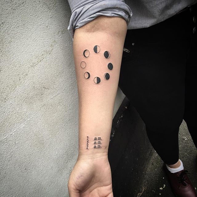Lunar phases forearm tattoo