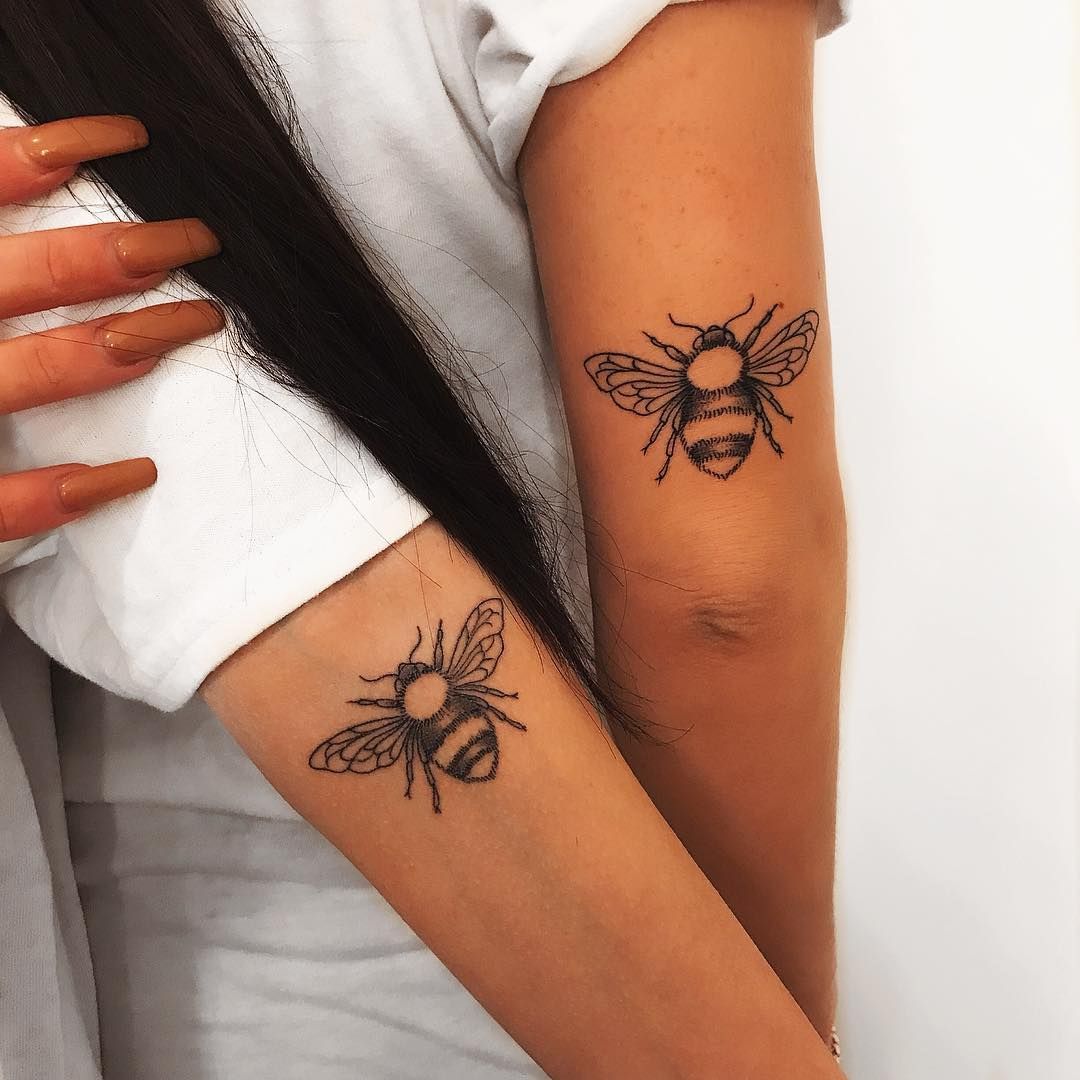 Matching bee tattoos
