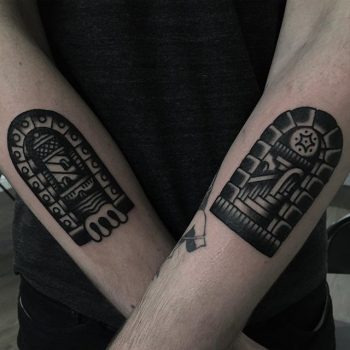 Matching doorway tattoos