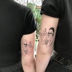 Matching linework tattoos for best friends