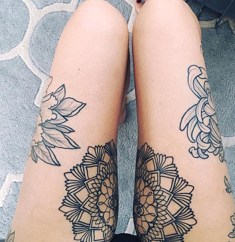 Matching mandala tattoo on the legs