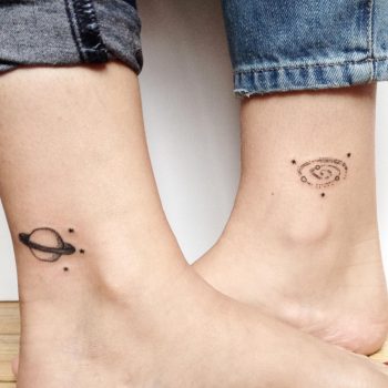 Matching saturn and spiral galaxy tattoo