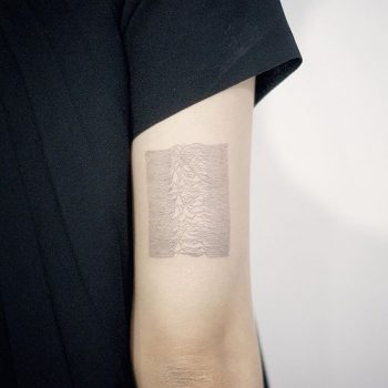 Minimalist style joy division tattoo