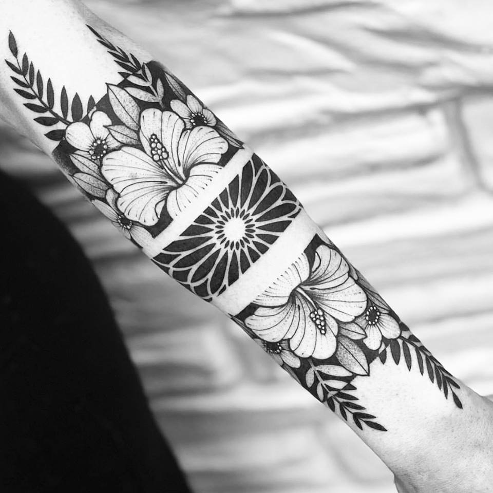 Negative space floral mandala and flowers tattoo