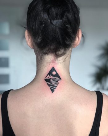 Negative space landscape rhombus tattoo