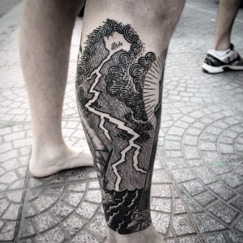 Negative space lightning bolt tattoo