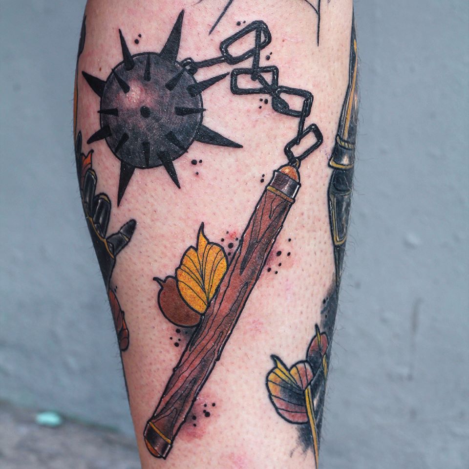 Neo traditional style tattoo of a spiked mace