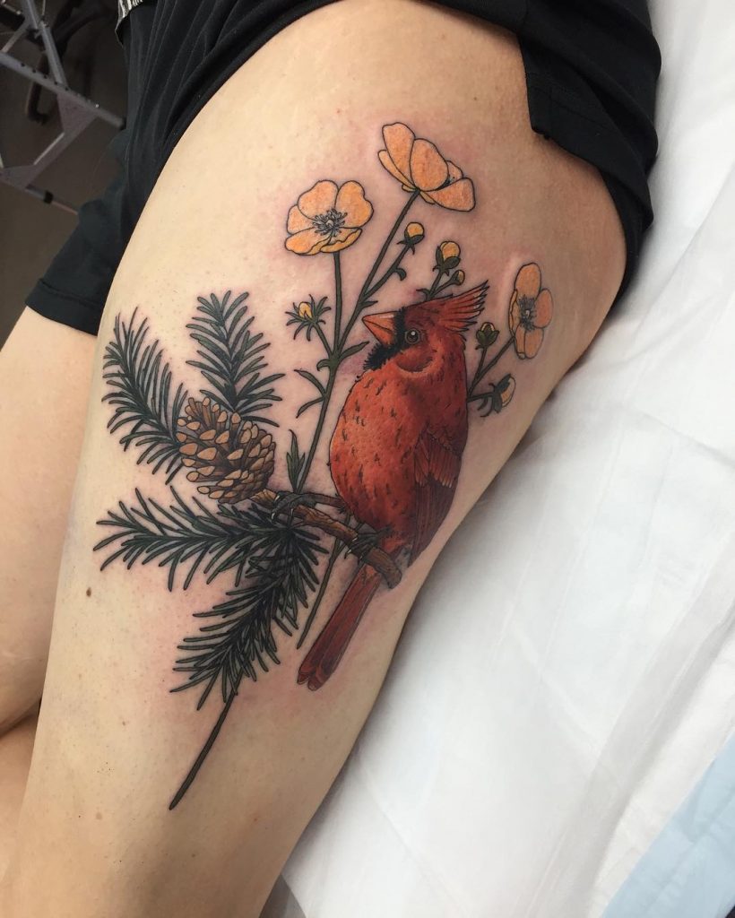 Northern cardinal sitting on a branch tattoo