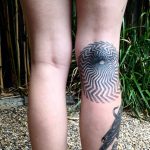 Optical illusion black and grey tattoo