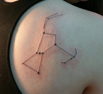 Orion constellation tattoo on the shoulder blade