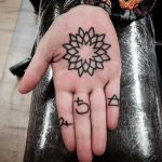 Outline mandala palm tattoo