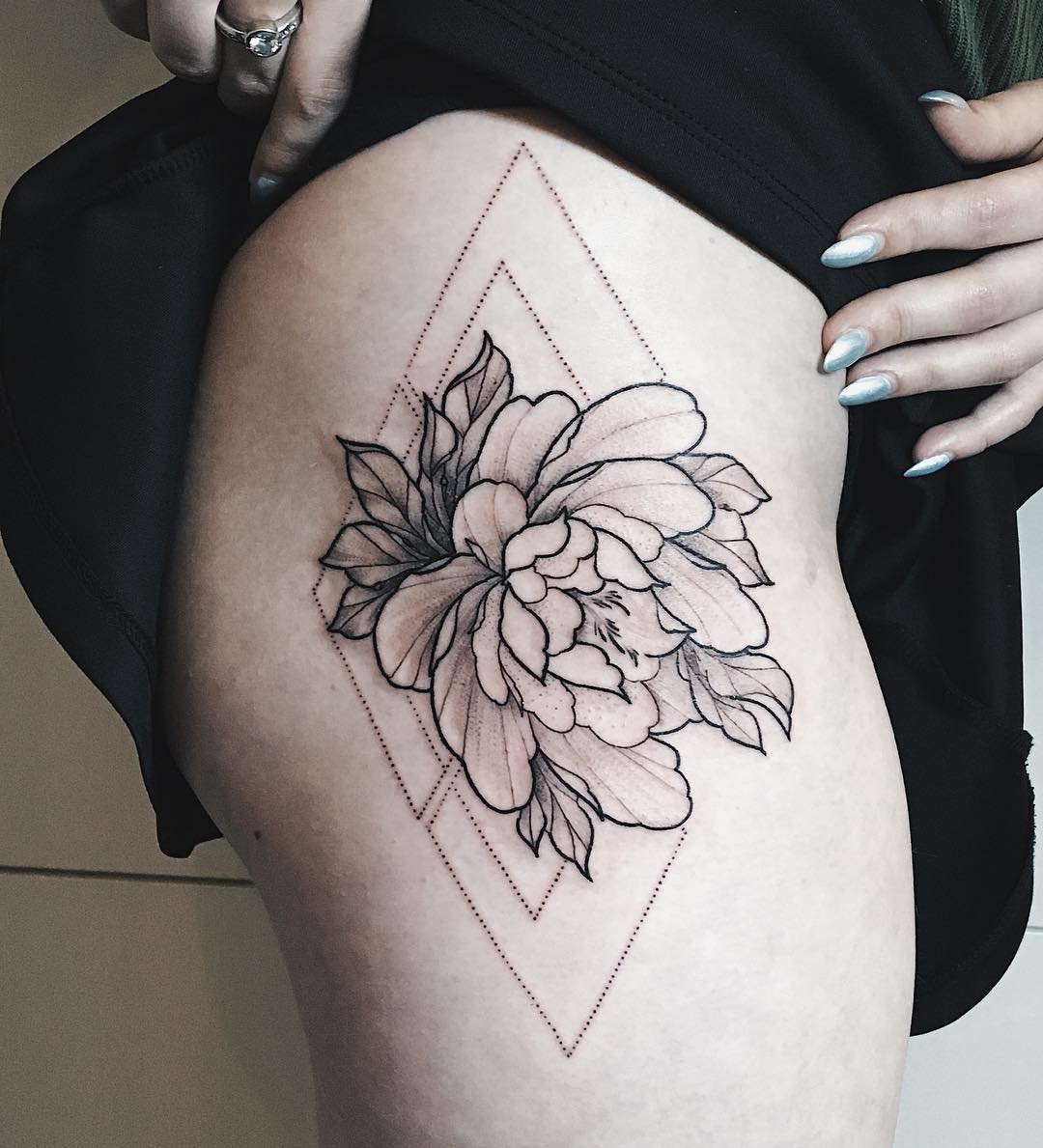 Peony in a rhombus tattoo
