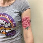 Pink flower tattoo