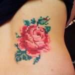 Pixel art tattoo of a rose