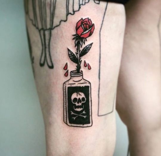 Poison bottle and red rose tattoo