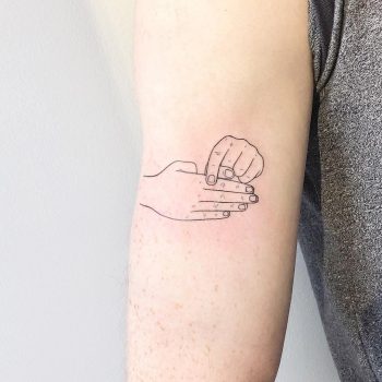 Removed finger tattoo