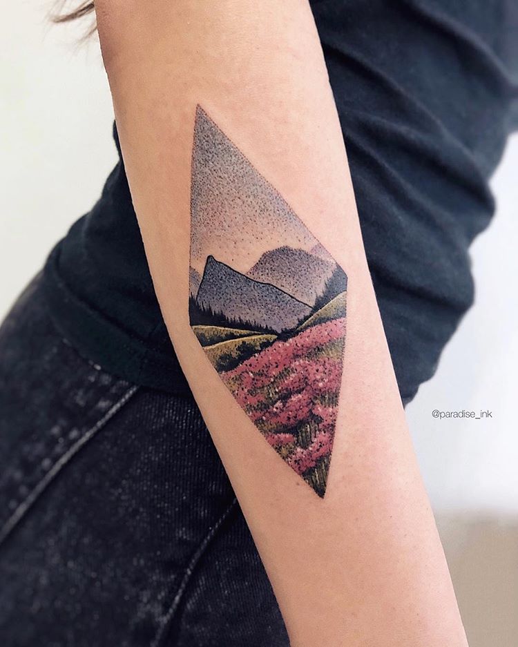 Rhombus shaped beautiful landscape tattoo