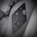 Rhombus shaped cosmic tattoo
