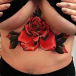 Rose underboob and sternum tattoo