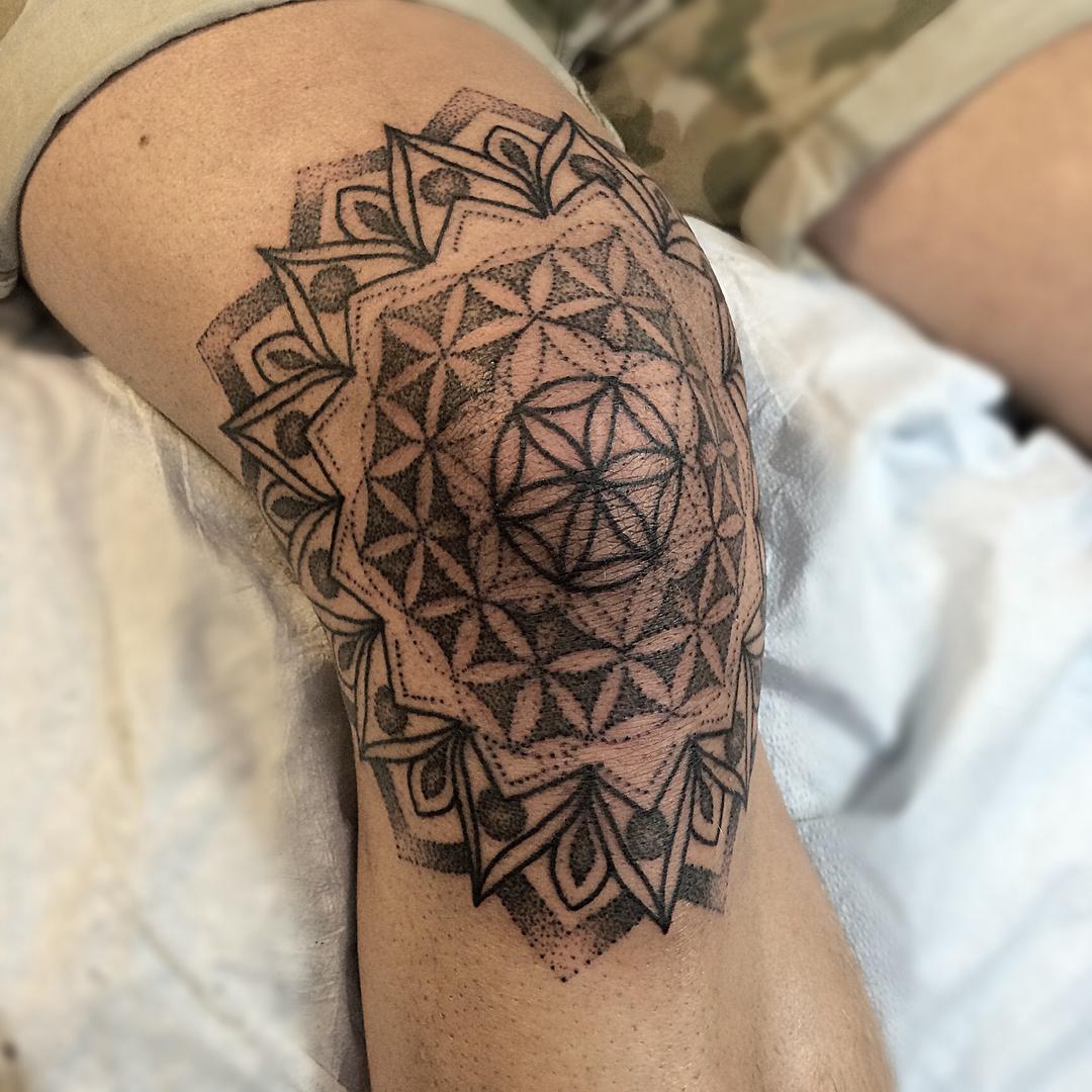 Sacred geometry knee tattoo