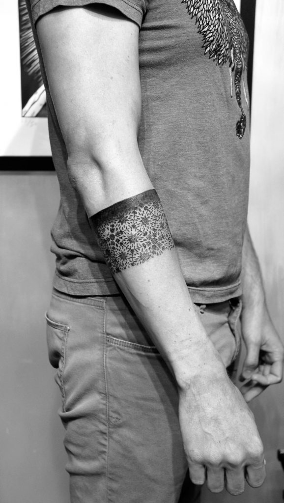 Sacred geometry pattern armband tattoo